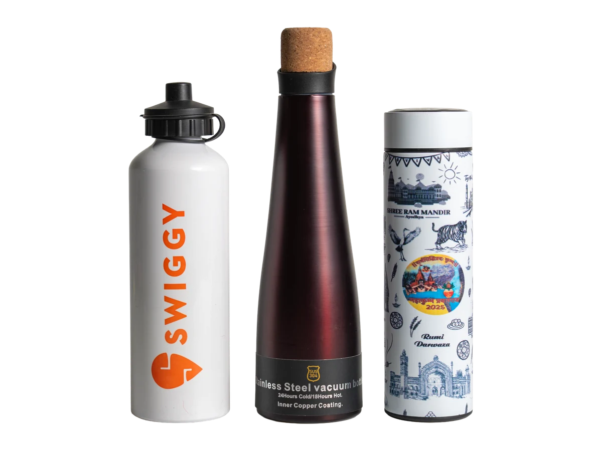 Three branded bottles and flasks in different shapes and finishes.