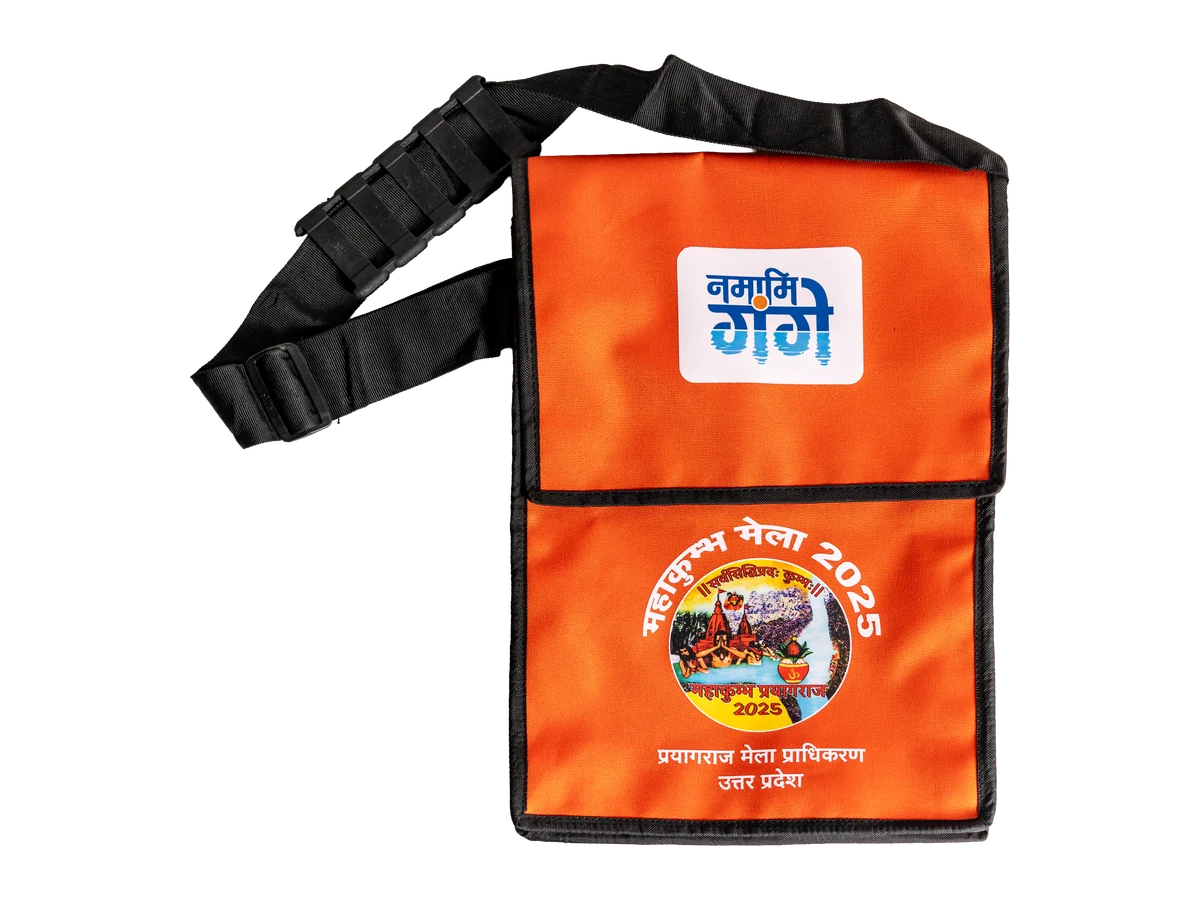 Orange and black shoulder bag with printed event artwork.