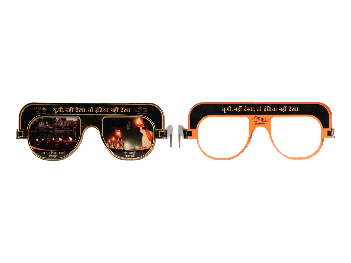 Two spectacle-shaped promotional giveaways with printed artwork.