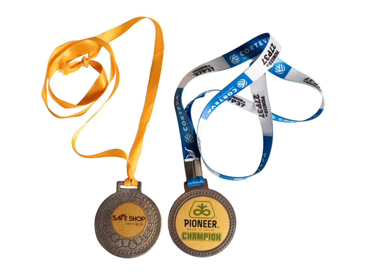 Two custom medals with branded neck ribbons.
