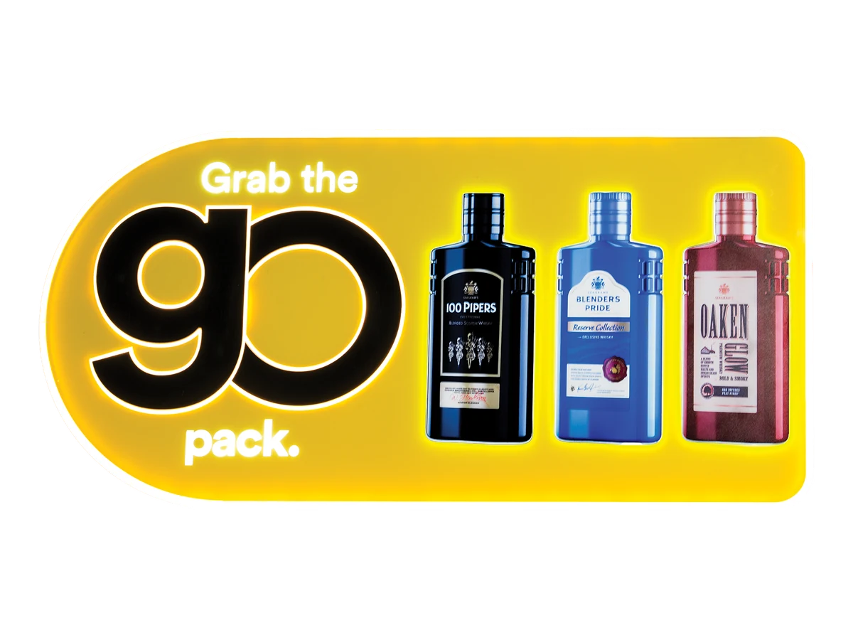 Wide illuminated retail display with printed bottle graphics.