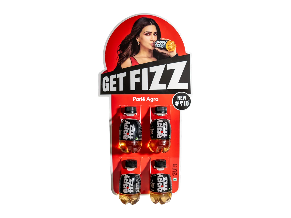 Hanging retail display carrying four small beverage bottles beneath a shaped header.