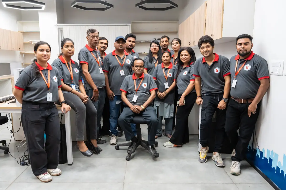 PPML colleagues together in a contemporary office workspace.