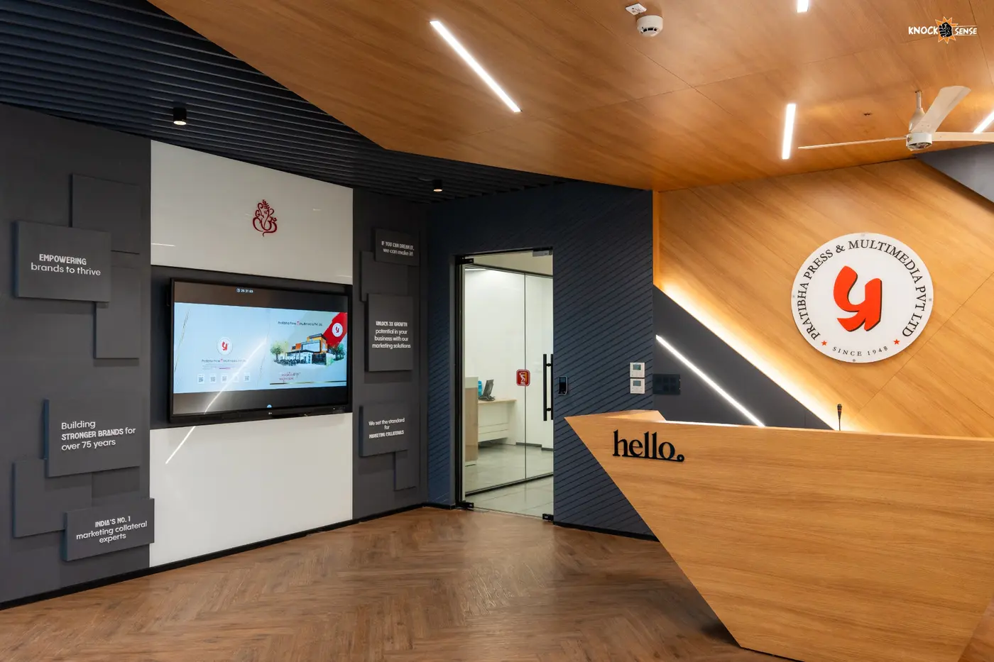 PPML reception at the Nadarganj facility with the company roundel on the timber feature wall.